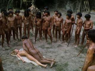 Племя дикарей по очереди насилуют белую девушку